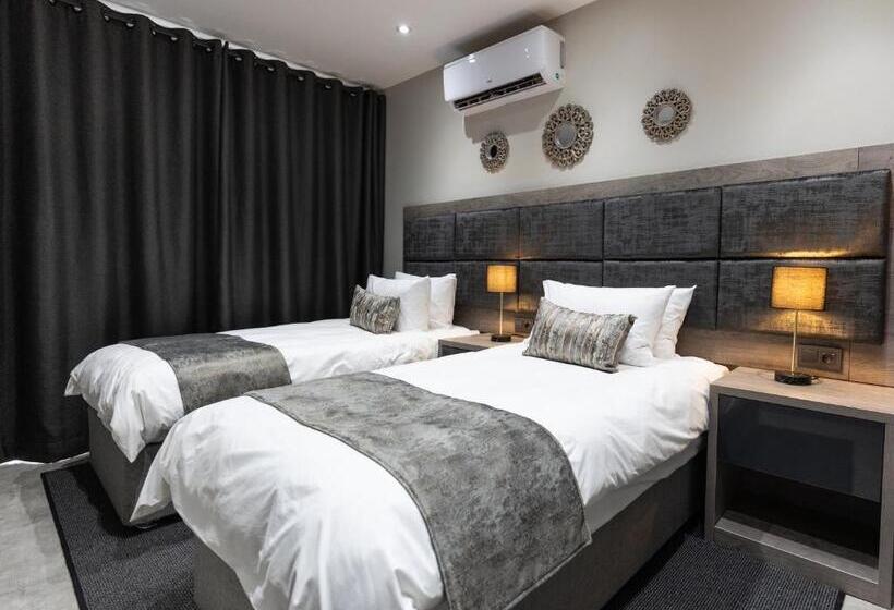 호텔 Luxe Suites Boutique