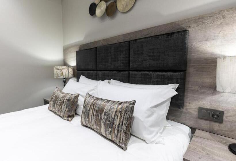 호텔 Luxe Suites Boutique