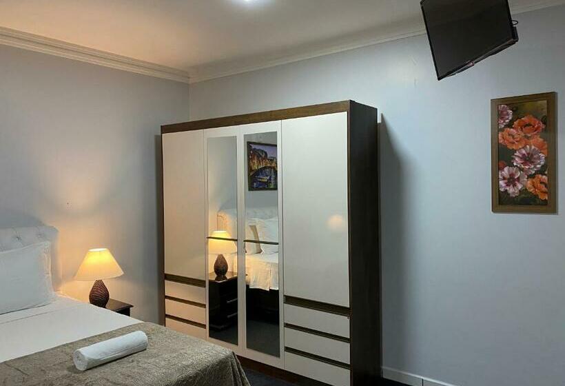 Отель Quarto Luxo Silver