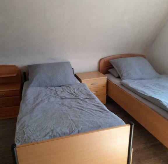 펜션 Ferienwohnung Am Brunnen