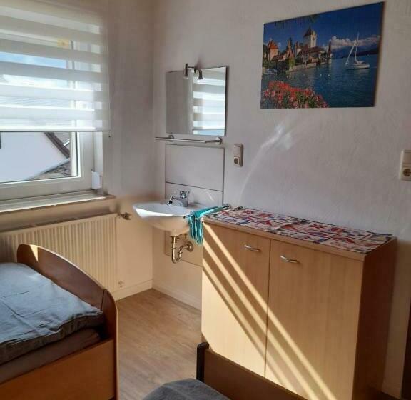 펜션 Ferienwohnung Am Brunnen