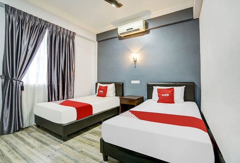 Отель Capital O 90490 Zaques