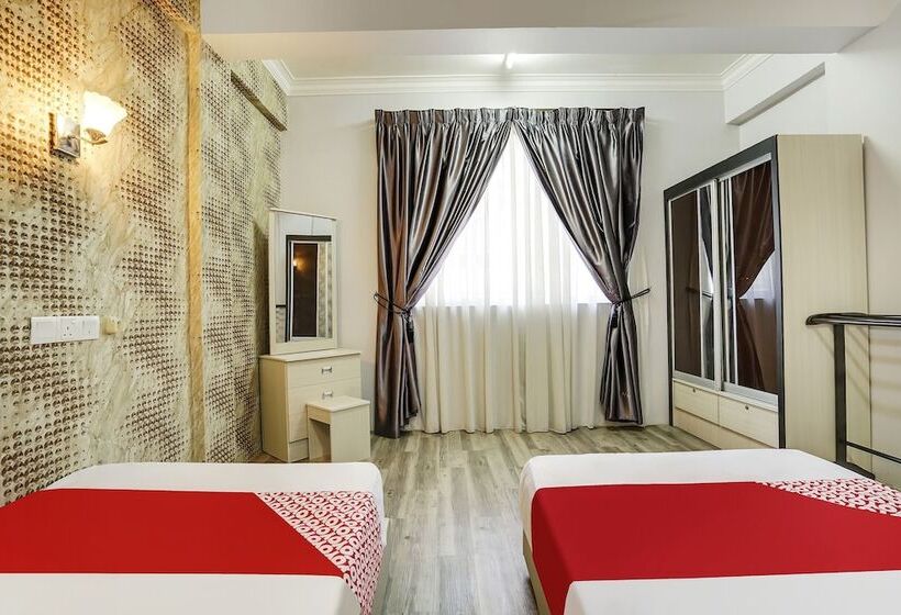 Отель Capital O 90490 Zaques