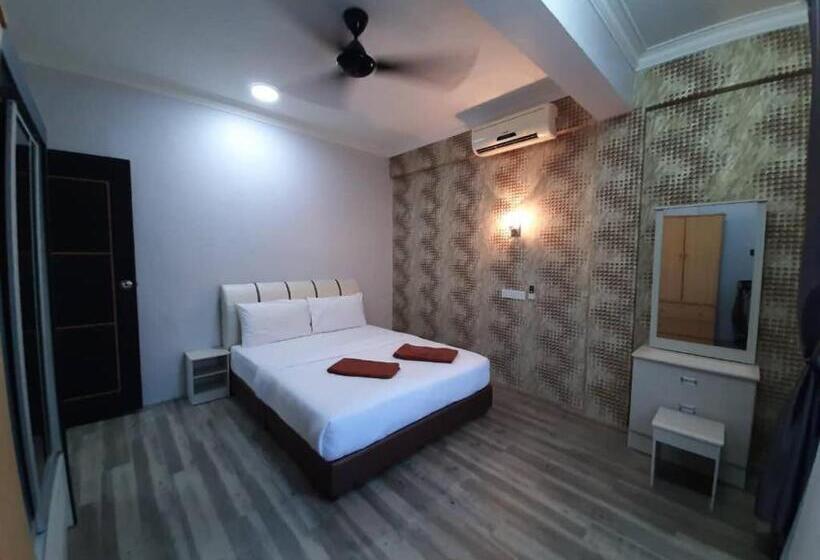 Отель Capital O 90490 Zaques