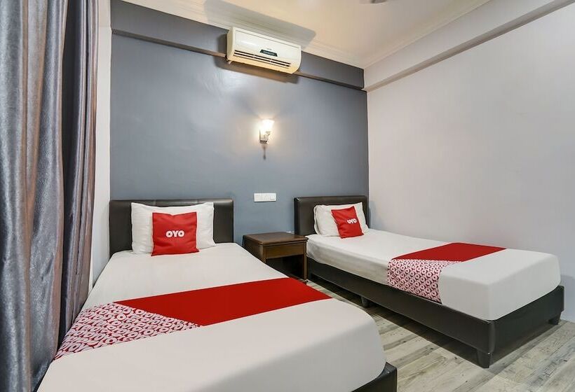 Отель Capital O 90490 Zaques