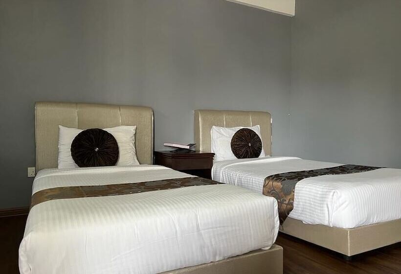 Отель Capital O 90490 Zaques