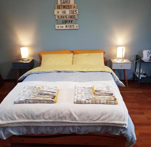 צימר Beachwalk Guesthouse