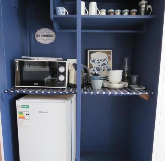 펜션 Koraalboom Guesthouse