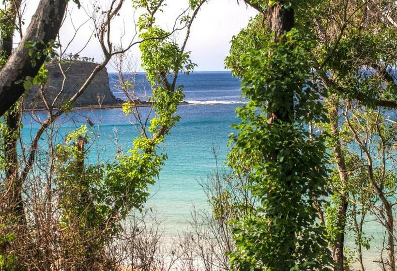 בית מלון כפרי Pebbly Beach Escape