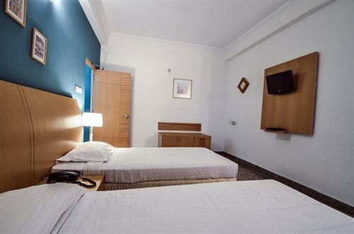 Отель Mandava Suites