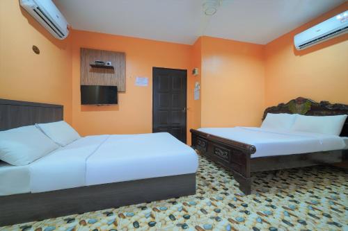 Spot On 89974 D Amigos Motel