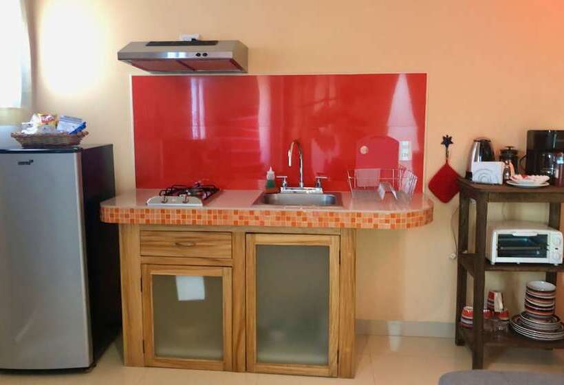 Отель Magnolias Boutique Suites & Spa