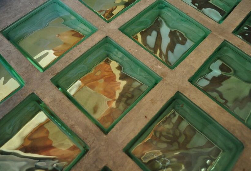 Отель Magnolias Boutique Suites & Spa