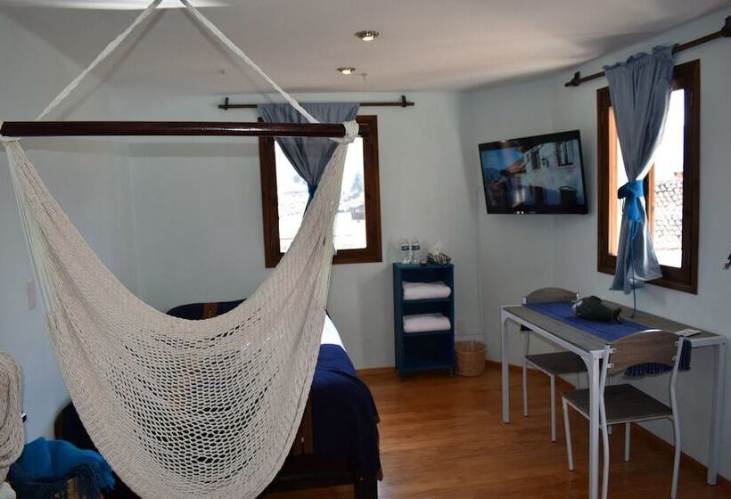 Отель Magnolias Boutique Suites & Spa