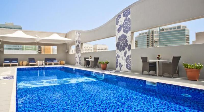 Отель Oaks Liwa Executive Suites