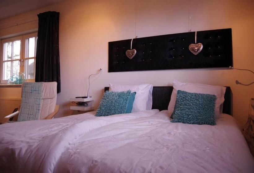 تختخواب و صبحانه De Beddestee