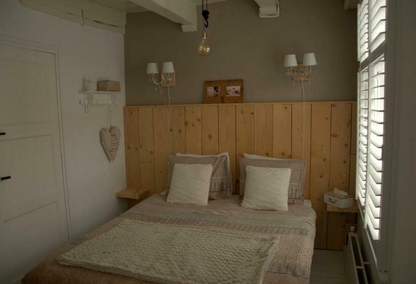 تختخواب و صبحانه De Slapende Leeuw