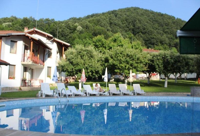 By The River Hotel Complex