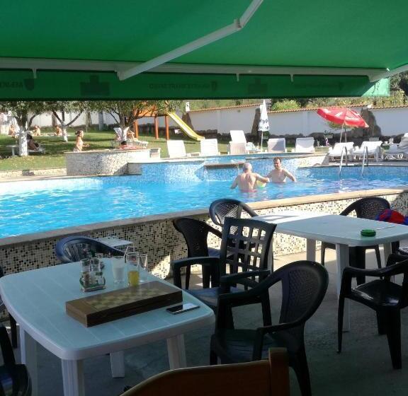 By The River Hotel Complex