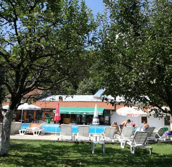 By The River Hotel Complex