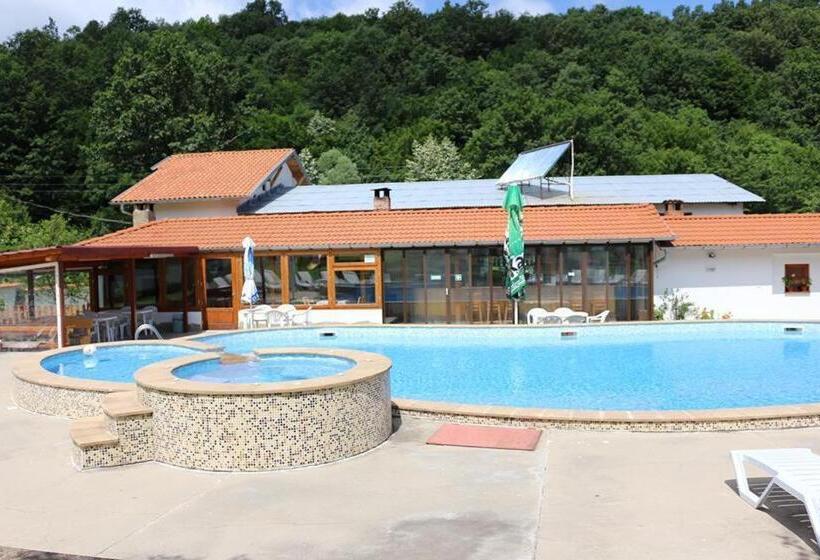 By The River Hotel Complex