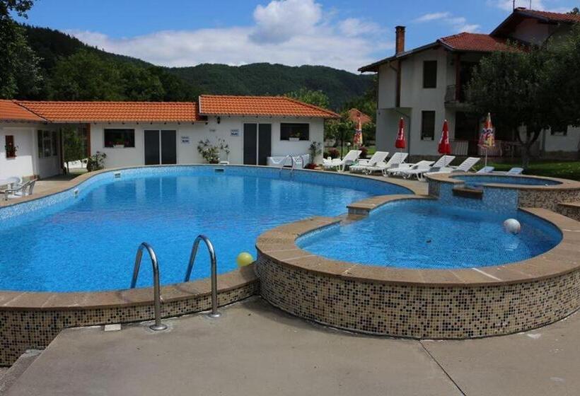 By The River Hotel Complex