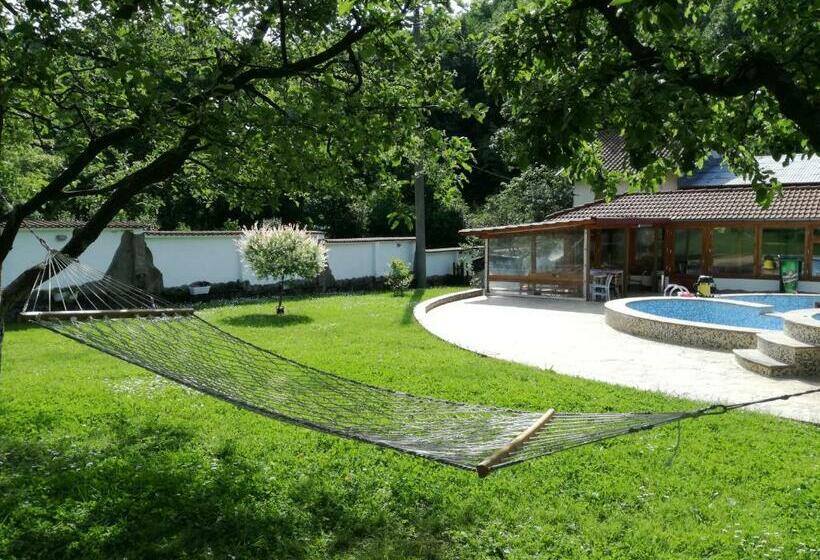 By The River Hotel Complex