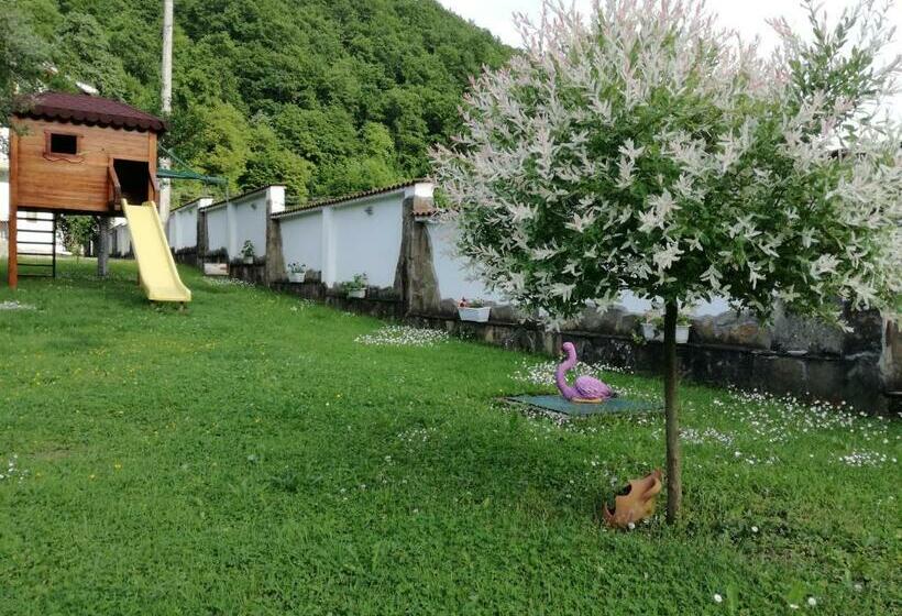 By The River Hotel Complex