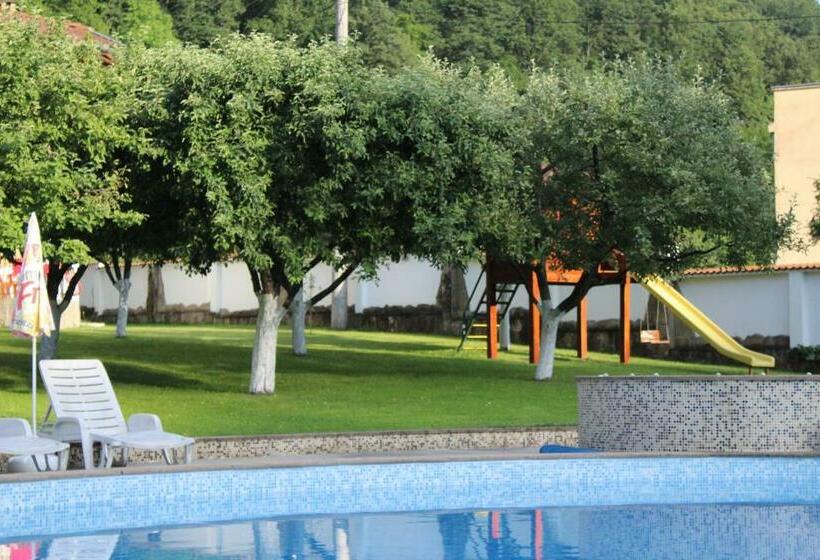 By The River Hotel Complex