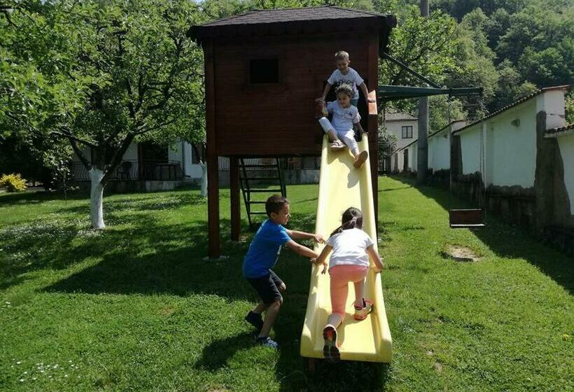 By The River Hotel Complex