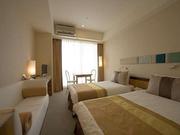 בית מלון כפרי The Beach Tower Okinawa