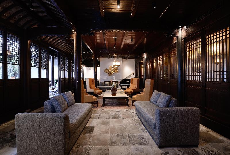 Отель Blossom Hill Inn Zhouzhuang Seasonland