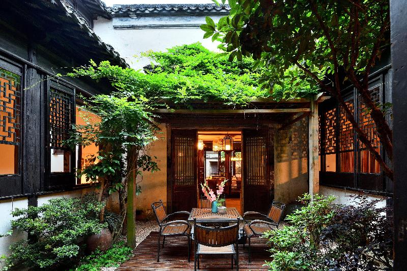 Отель Blossom Hill Inn Zhouzhuang Seasonland