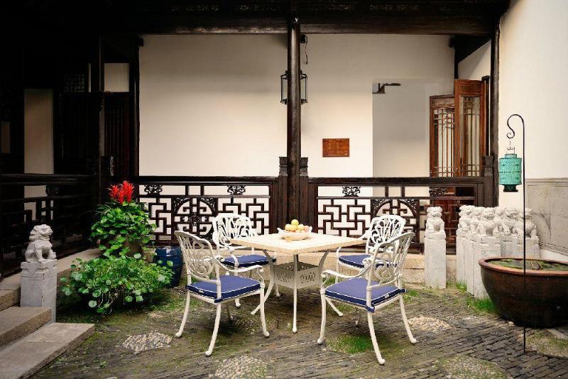 Отель Blossom Hill Inn Zhouzhuang Seasonland