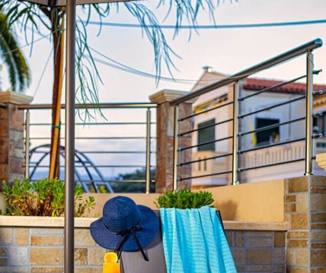 בית מלון כפרי Theos Village Apartments