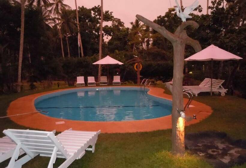 Отель Dalmanuta Gardens