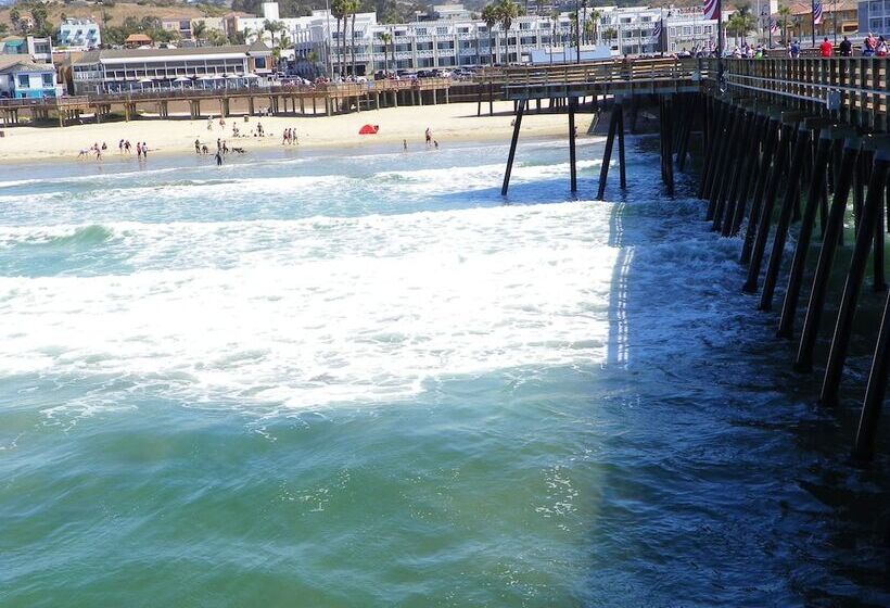 فندق Beach House Inn & Suites