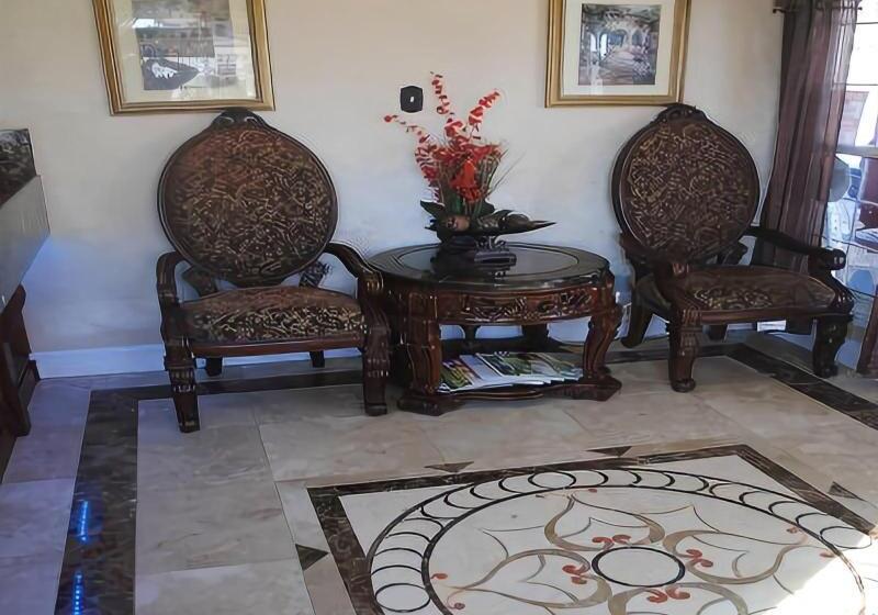 فندق Travel Inn And Suites