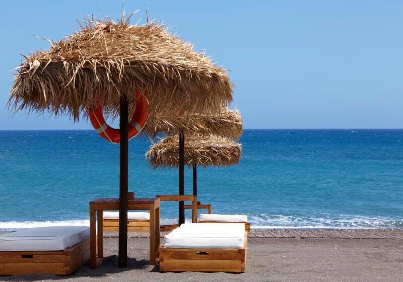 酒店 Black Rose Beach Suites