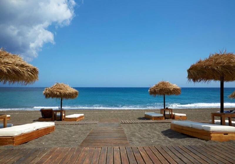 酒店 Black Rose Beach Suites