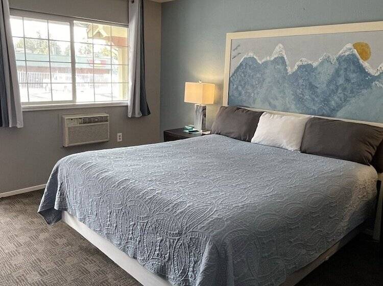 מוטל Bluebird Day Inn & Suites