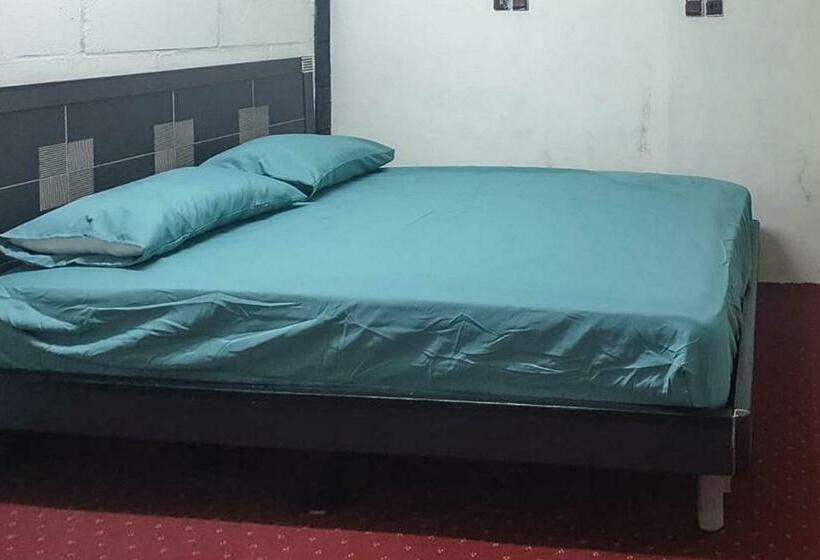 호텔 Rocky Guest House Syariah Mitra Reddoorz