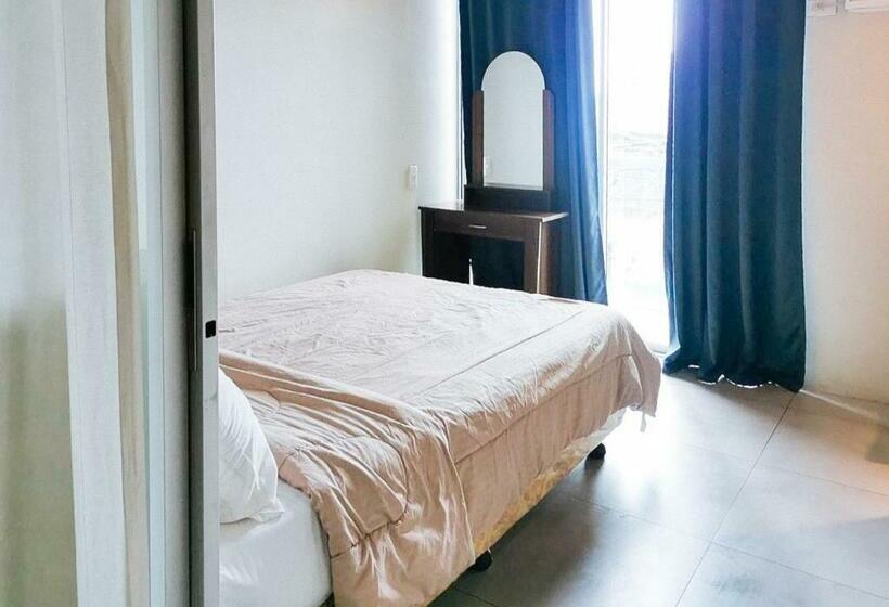 Отель Gmrentals Apartment At Mactan Airport