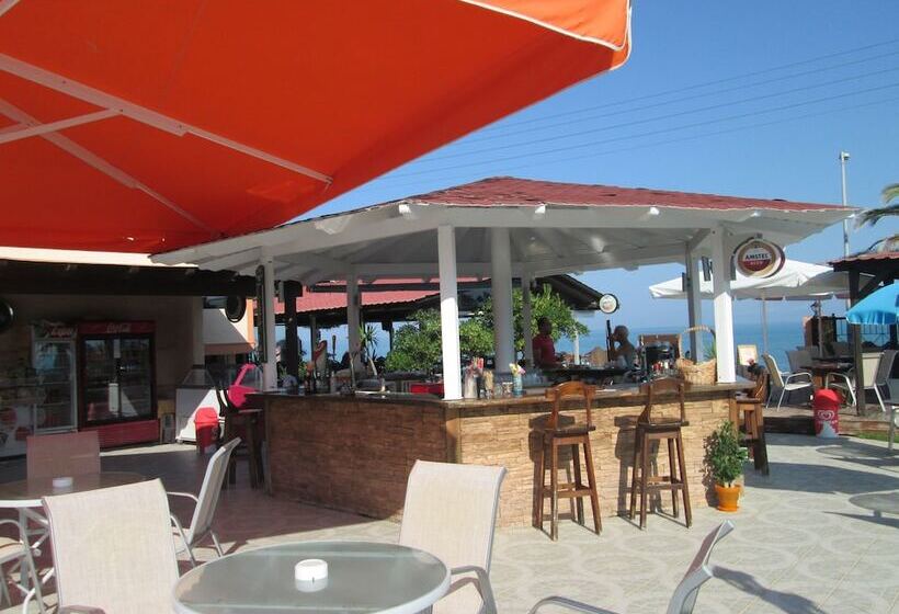 Отель Ninos On The Beach