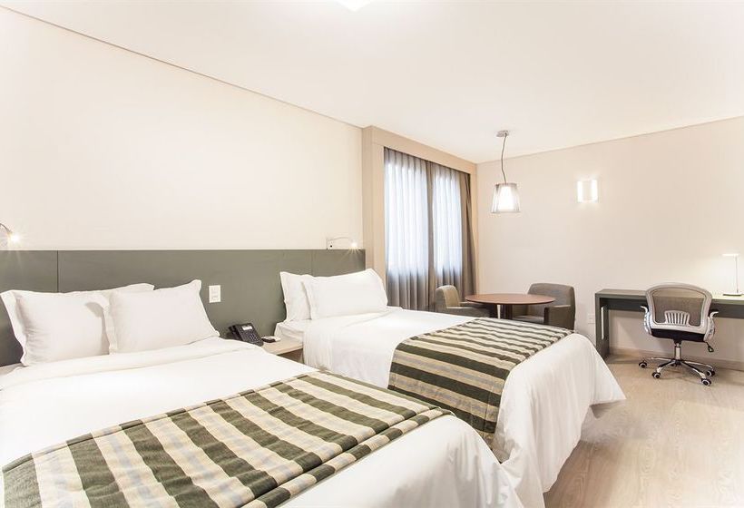 Отель Esuites Sion  Savassi