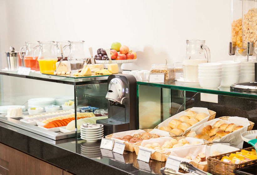 Отель Esuites Sion  Savassi