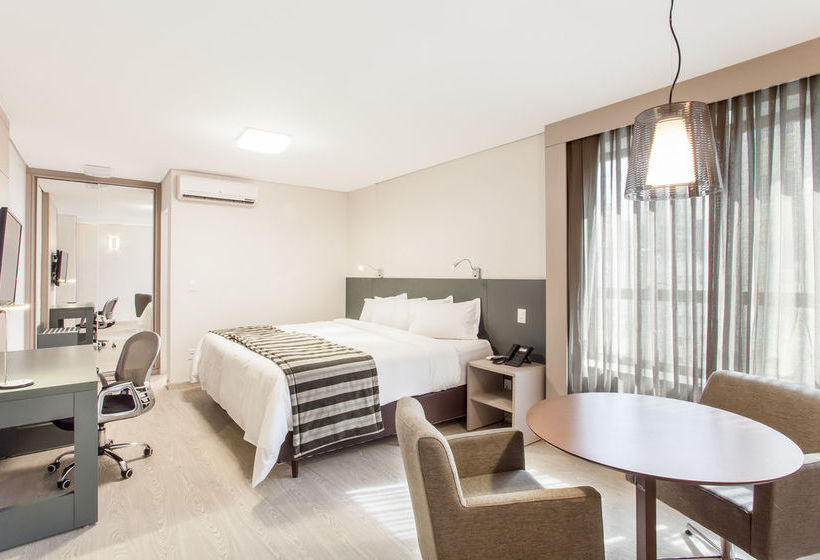 Отель Esuites Sion  Savassi