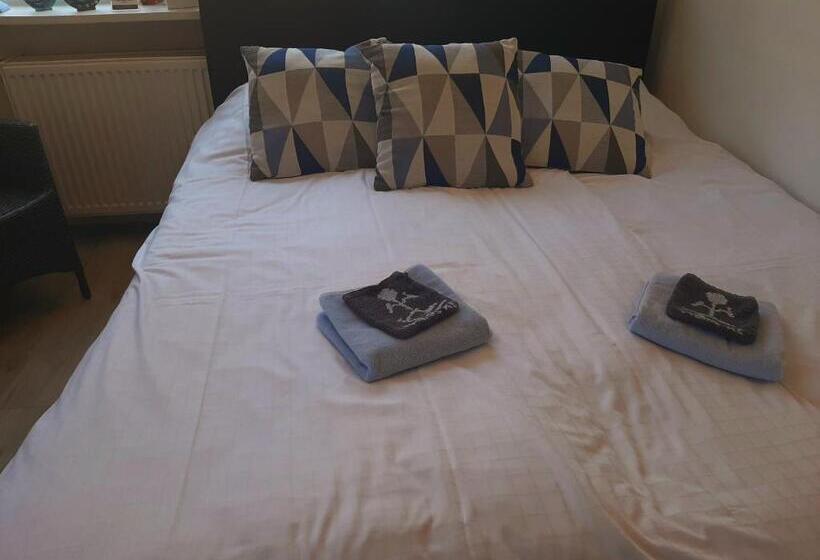 צימר Tuinhuis Duinroos Deluxe