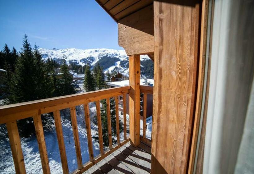 Отель Hôtel Le Chamois D Or, Ussim Vacances Méribel