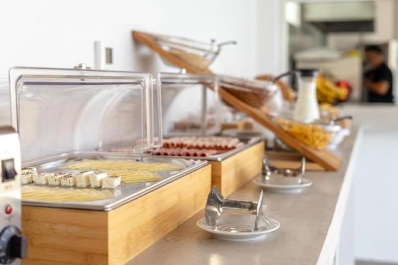 호텔 Kouros Home & Suites